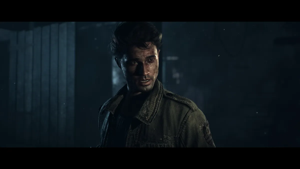 مرد جوانی با کاپشن و صورت خاکی در فضایی تاریک؛ نمایی سینمایی از آنتیل داون (Until Dawn)